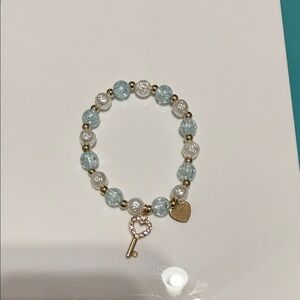 Elegant Gold and Blue Beaded Bracelet